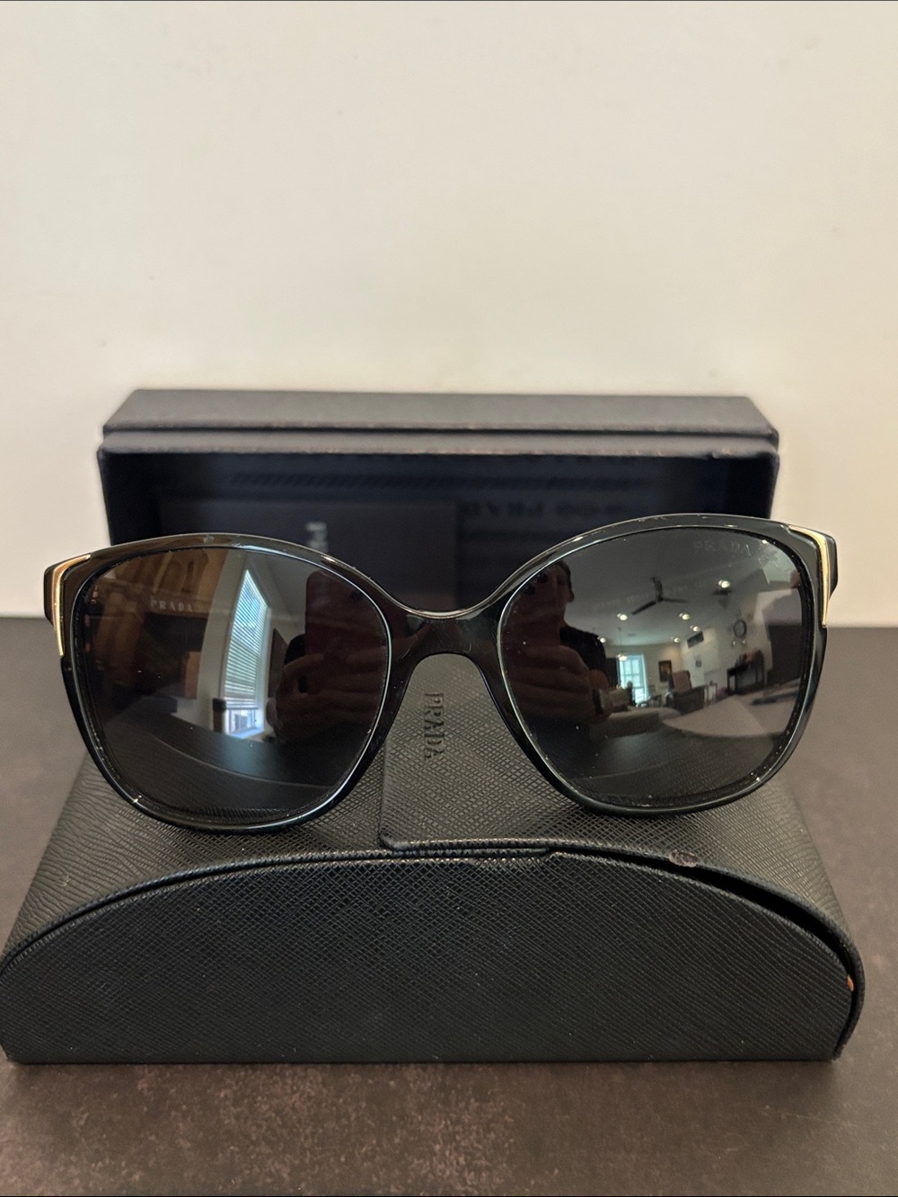 Prada Black Women's Oversized Cat-Eye Sunglasses with Gold Accents